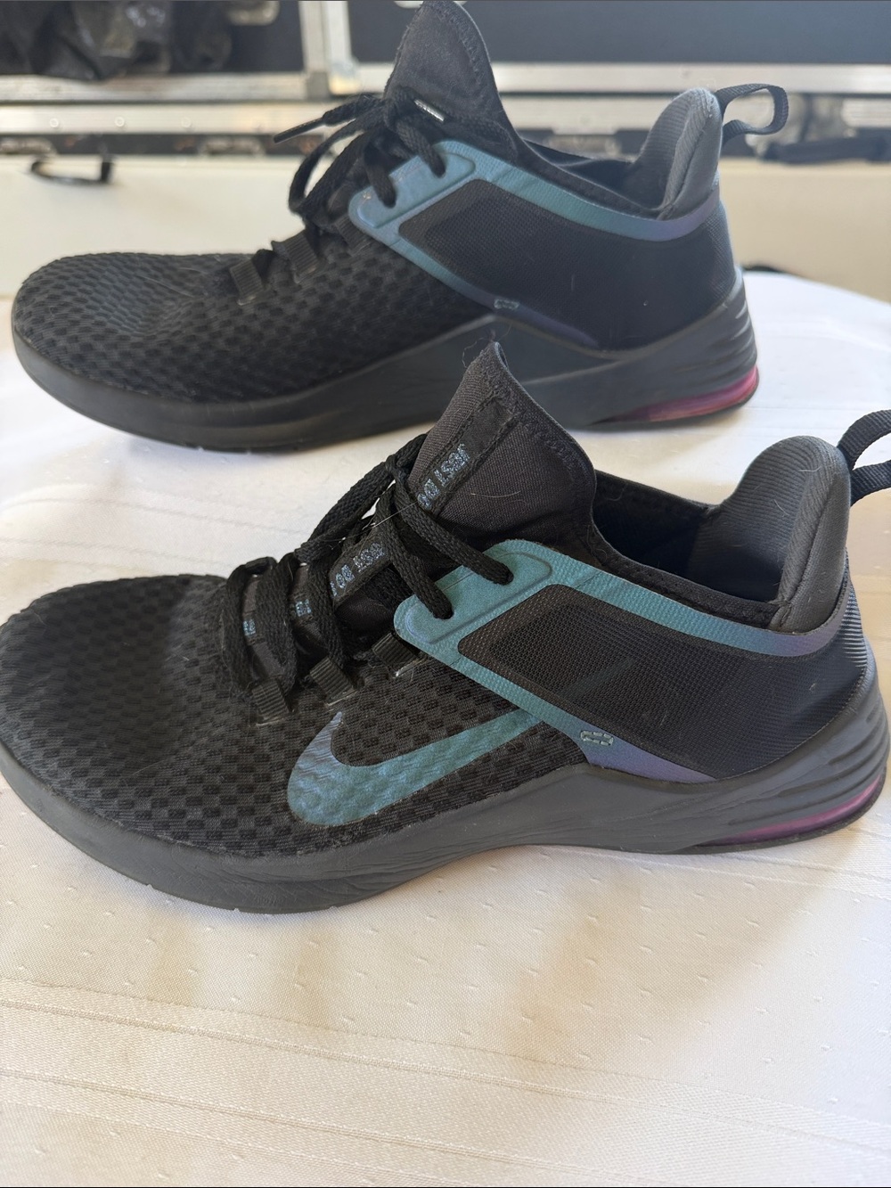 Nike Women's Black Athletic Sneakers with Teal-Purple Iridescent Accents